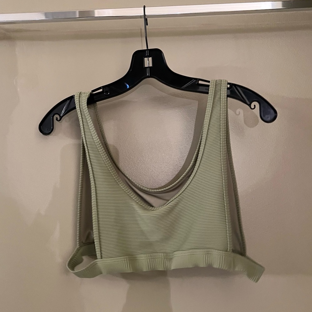 Olive green ribbed top with open sides